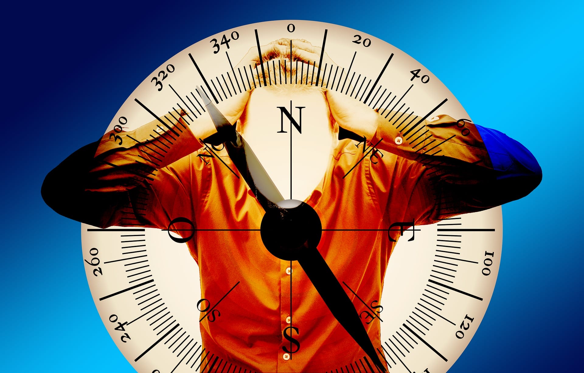 homme boussole qui se prend la tête